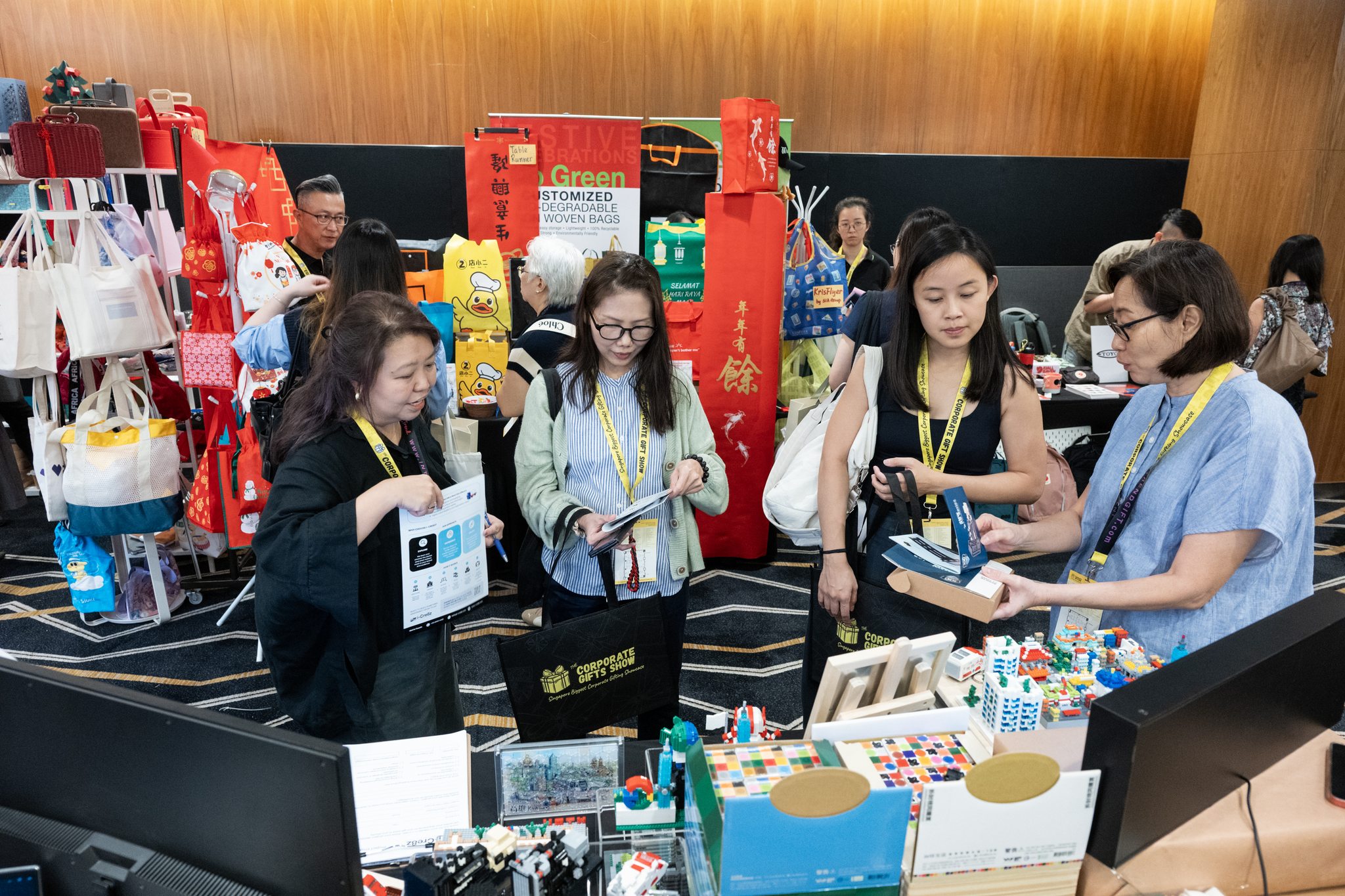 Visitors exploring corporate gift displays